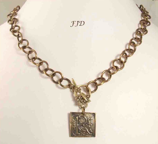 Bronze and Antiqued Brass Initial Necklace